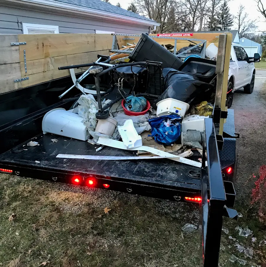 Roll-off dumpster delivered to a residential driveway in Bandon
