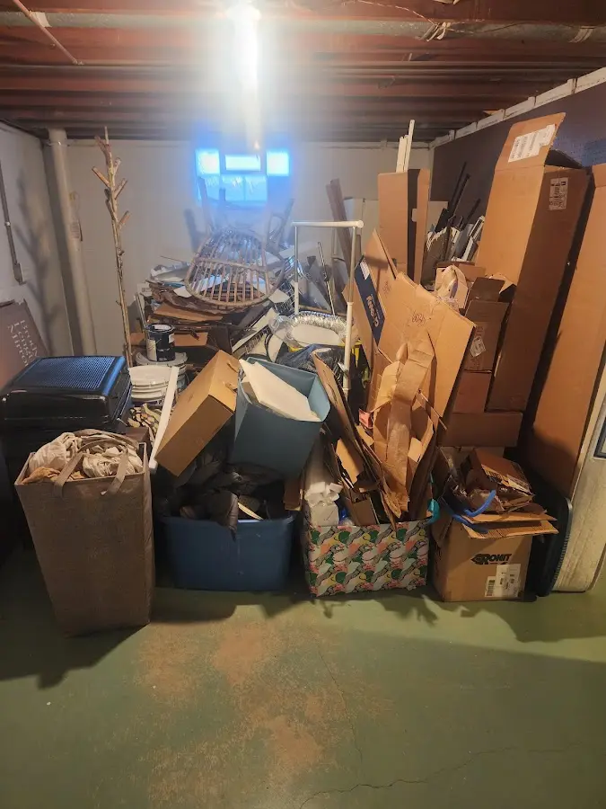 Roll-off dumpster container at job site for 2 Yard Dumpster Rental in Bandon